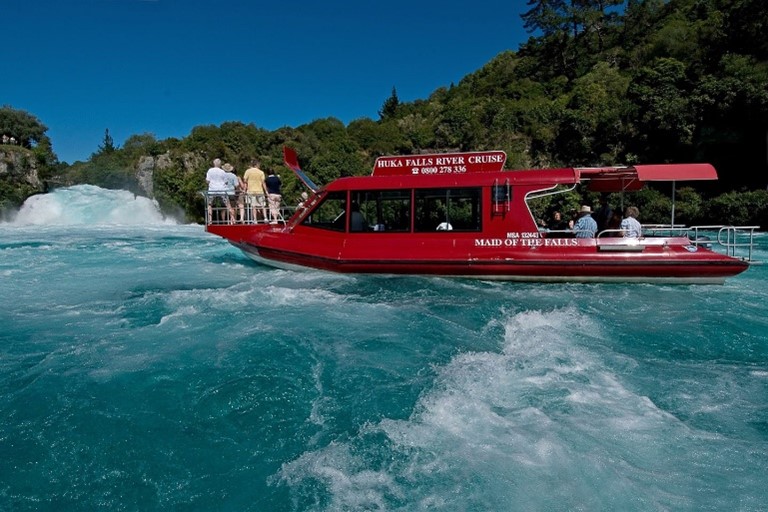 Red boat on Huka River